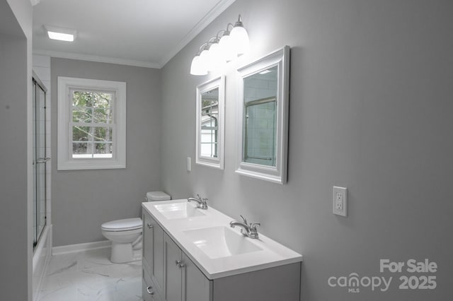 full bathroom featuring vanity, ornamental molding, toilet, and combined bath / shower with glass door