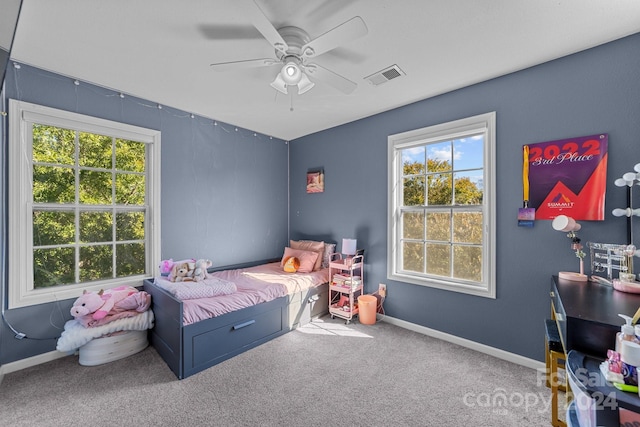 bedroom featuring ceiling fan and carpet flooring