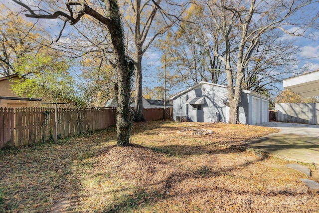 view of yard featuring a garage