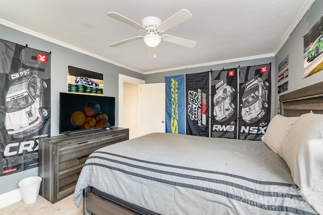 carpeted bedroom with ceiling fan and crown molding