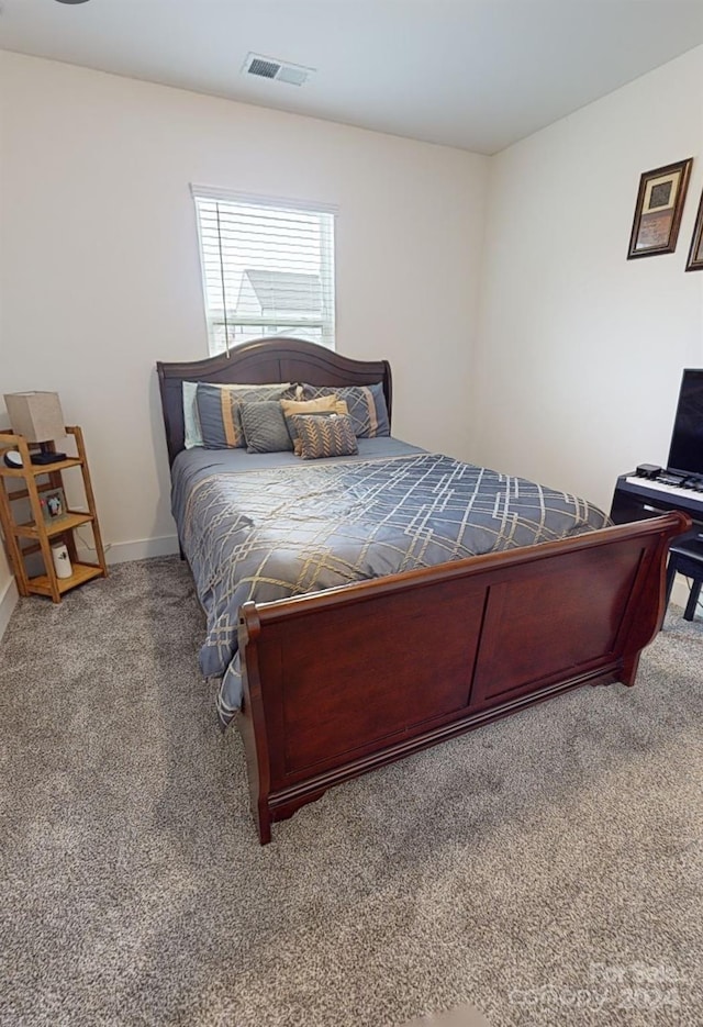 bedroom featuring carpet flooring