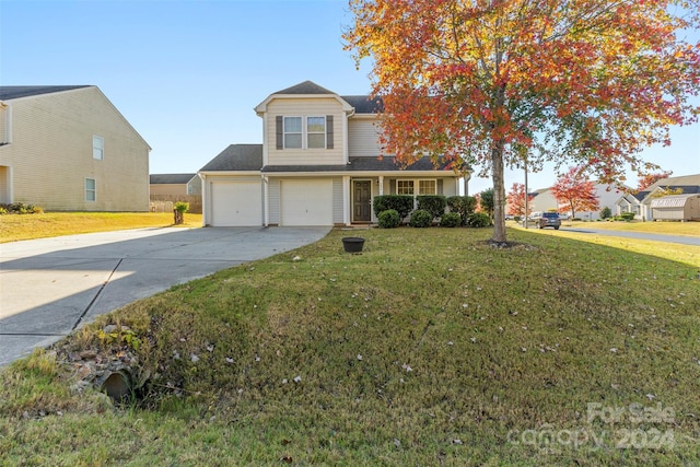 view of property featuring a front lawn