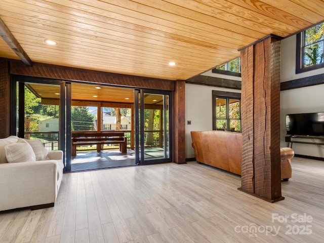 entryway with wooden ceiling, wood finished floors, and recessed lighting