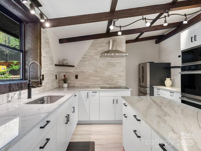 kitchen featuring open shelves, a sink, stainless steel appliances, wall chimney exhaust hood, and backsplash