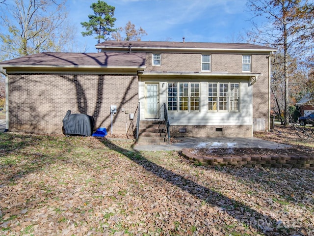 rear view of house featuring a patio area