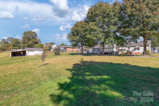 view of yard featuring a garage