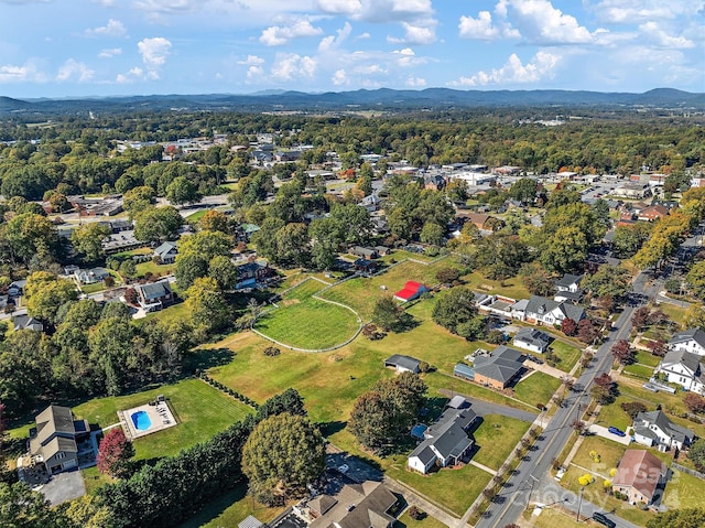 drone / aerial view featuring a mountain view