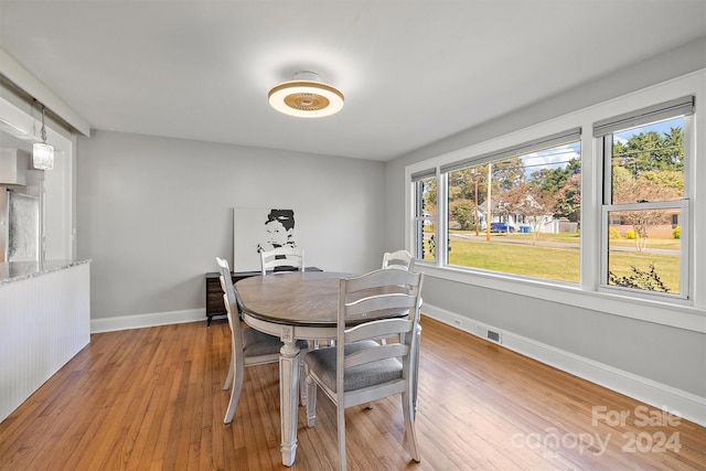 dining room featuring light wood-type flooring