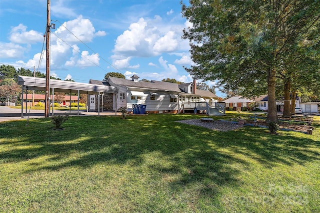 view of yard with a wooden deck