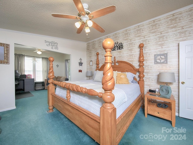 bedroom with ceiling fan, a textured ceiling, carpet floors, and ornamental molding