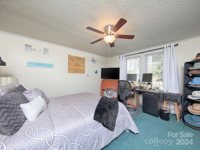 bedroom featuring crown molding, ceiling fan, carpet, and a textured ceiling