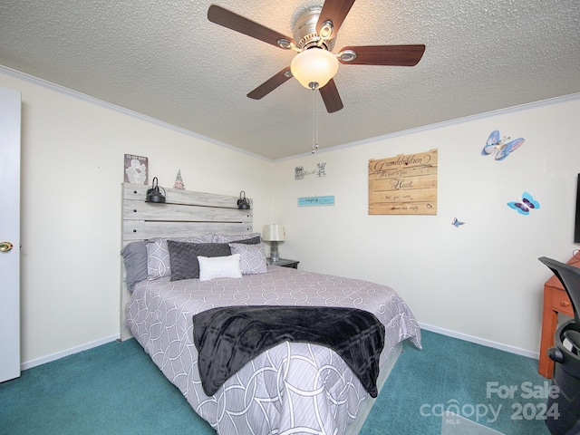 bedroom featuring carpet floors, ornamental molding, a textured ceiling, and ceiling fan