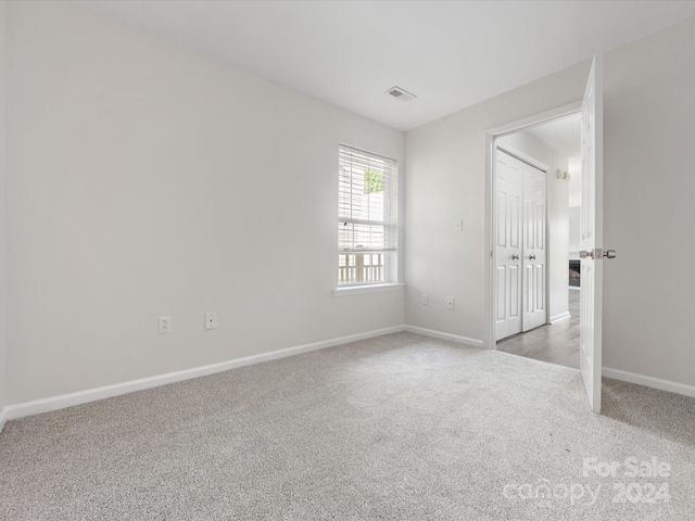 view of carpeted spare room