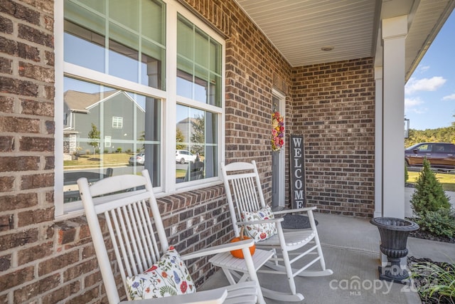 view of patio featuring a porch