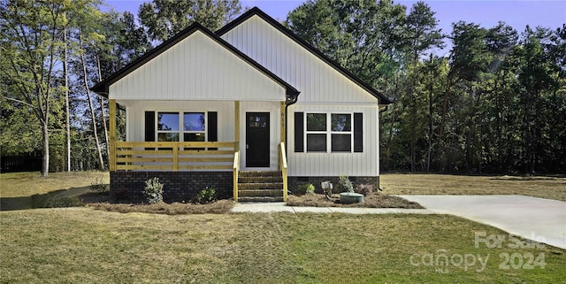 modern farmhouse with a front yard