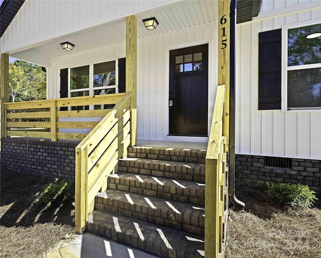 entrance to property with a porch