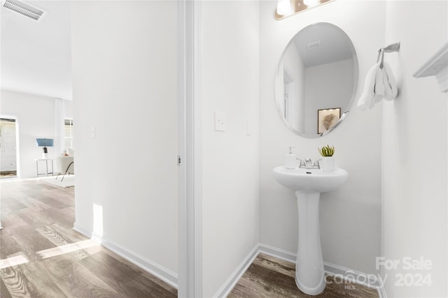 bathroom featuring hardwood / wood-style floors