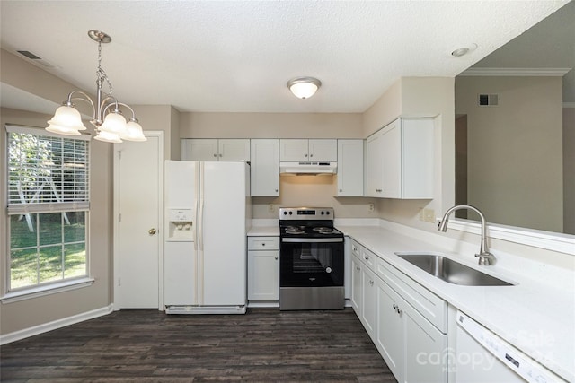 kitchen with a healthy amount of sunlight, white cabinetry, white appliances, and sink