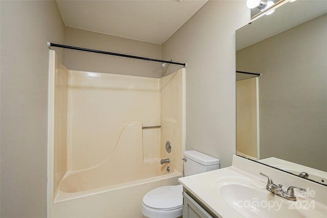 full bathroom featuring shower / bathing tub combination, vanity, and toilet