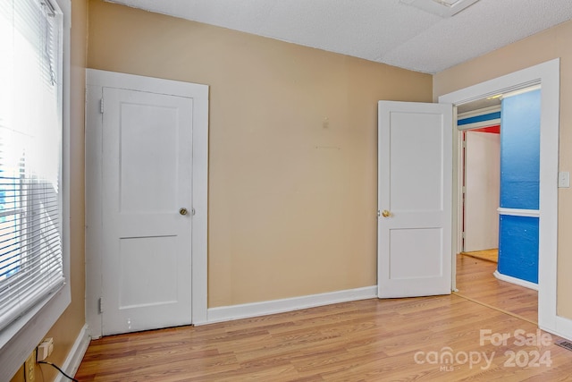 unfurnished bedroom featuring light hardwood / wood-style floors