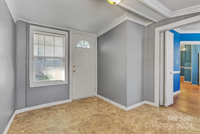 entryway with crown molding