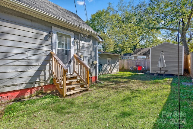 view of yard with a shed