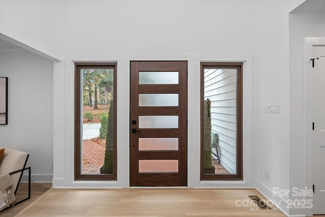 foyer entrance featuring light hardwood / wood-style floors