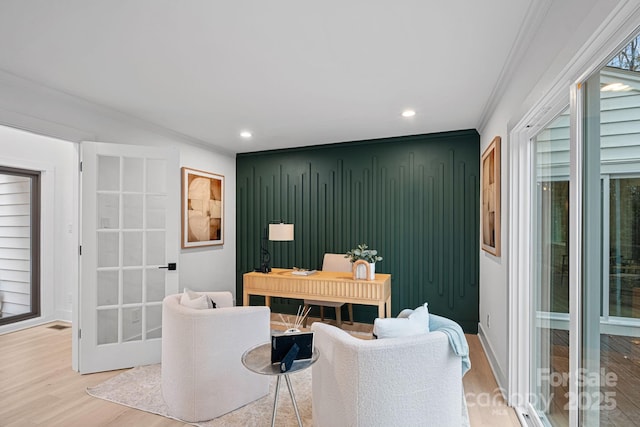 office area with french doors, hardwood / wood-style floors, and ornamental molding