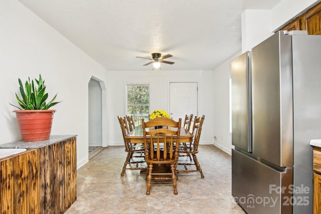 dining area with ceiling fan