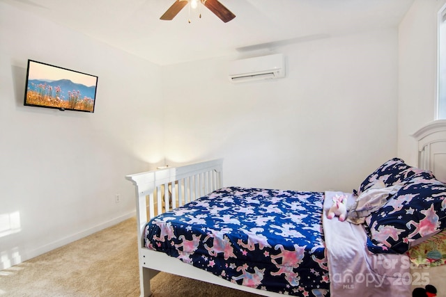 bedroom with an AC wall unit, ceiling fan, and carpet flooring