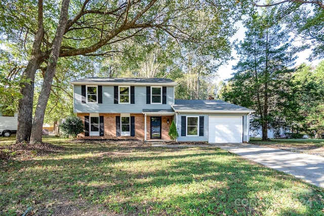 view of front of house featuring a garage and a front yard