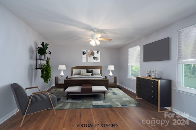 bedroom featuring multiple windows, ceiling fan, and dark hardwood / wood-style flooring