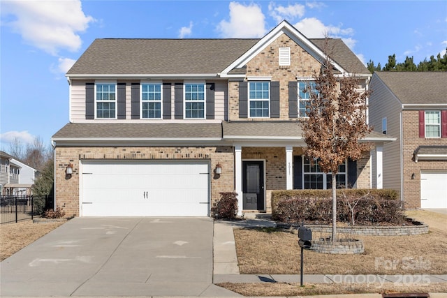 view of front of property featuring a garage