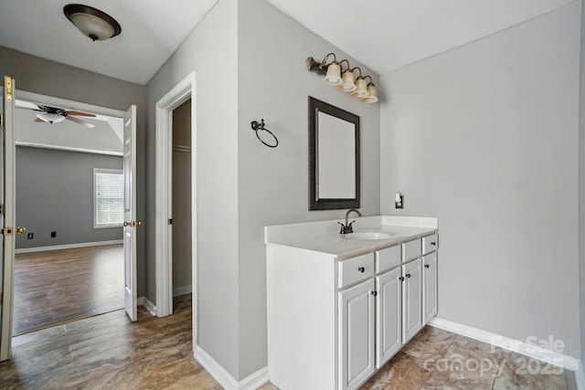 3007 Gambrill Falls Dr, Indian Trail, NC 28079 - bathroom with baseboards, a ceiling fan, and vanity