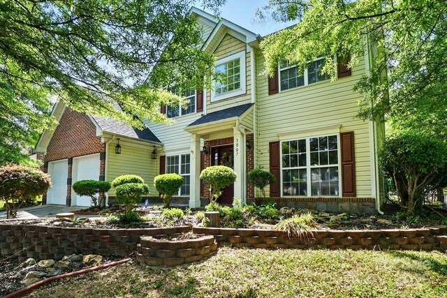 3007 Gambrill Falls Dr, Indian Trail, NC 28079 - traditional-style home with driveway and a garage
