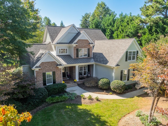 view of front of property with a front lawn