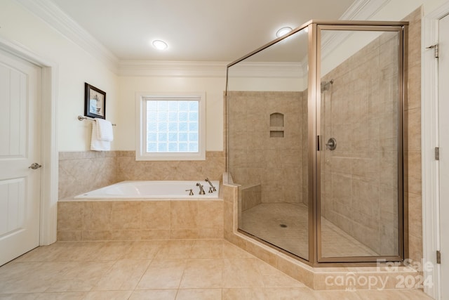 bathroom with ornamental molding, shower with separate bathtub, and tile patterned flooring