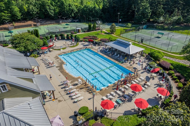 view of swimming pool featuring a patio area