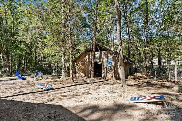 view of playground with an outdoor structure