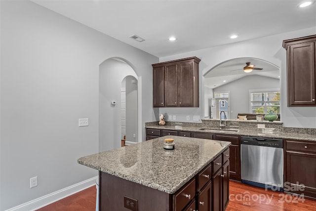 3157 Delaware Dr, Denver, NC 28037 - kitchen featuring arched walkways, stainless steel dishwasher, a center island, a sink, and visible vents