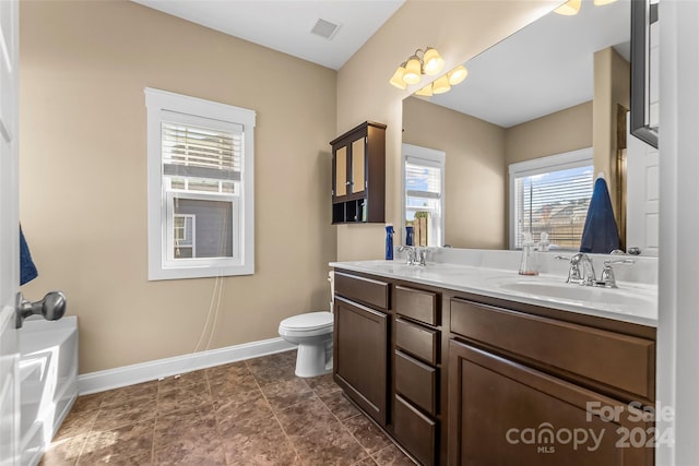 3157 Delaware Dr, Denver, NC 28037 - full bathroom featuring a sink, toilet, double vanity, visible vents, and baseboards