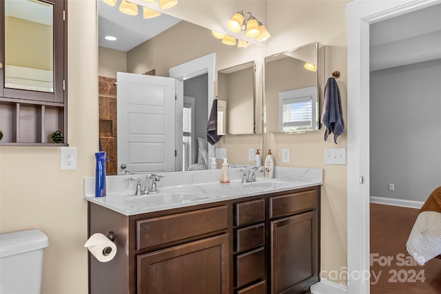 3157 Delaware Dr, Denver, NC 28037 - full bath featuring double vanity, toilet, baseboards, and a sink