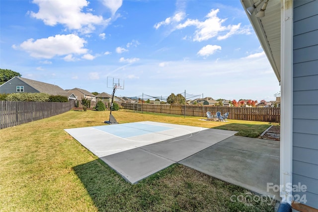 3157 Delaware Dr, Denver, NC 28037 - view of sport court with basketball court, a yard, and a fenced backyard