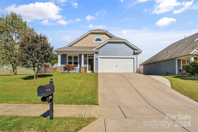 3157 Delaware Dr, Denver, NC 28037 - view of front of property with a front yard, concrete driveway, a garage, and a porch