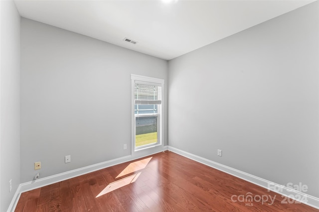 3157 Delaware Dr, Denver, NC 28037 - spare room with visible vents, wood finished floors, and baseboards