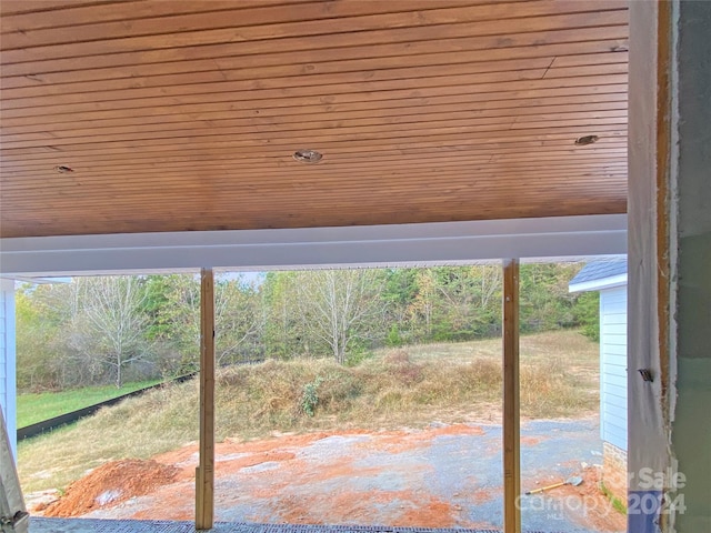 interior space with wood ceiling