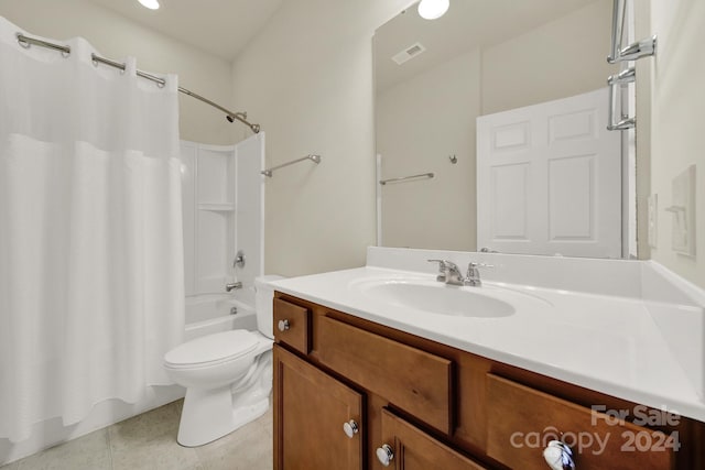 full bathroom featuring vanity, shower / tub combo, toilet, and tile patterned floors