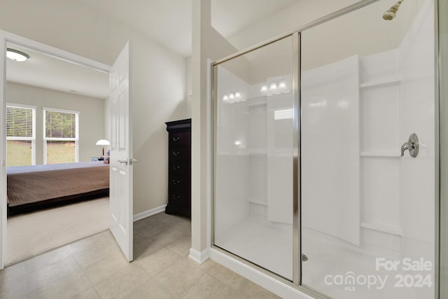 bathroom featuring an enclosed shower