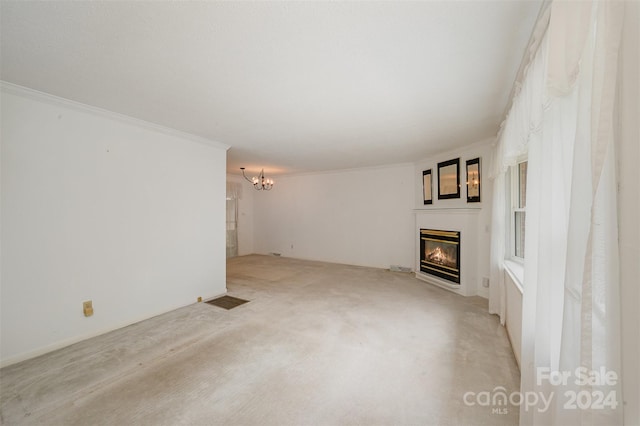 unfurnished living room featuring a chandelier, light carpet, and crown molding