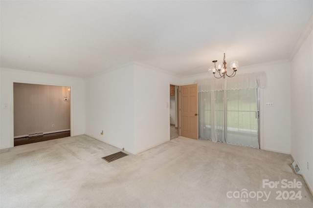 empty room with crown molding, carpet floors, and an inviting chandelier